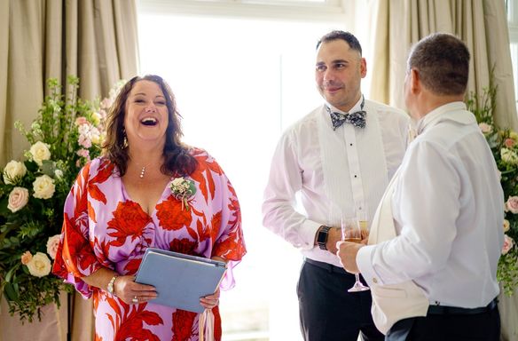Sara, Laughing with a Groom and Best Man